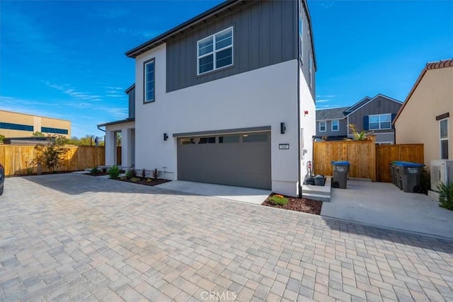 160 Earthwood Ln, San Luis Obispo, CA 93401 - view of front of house featuring driveway, an attached garage, and fence