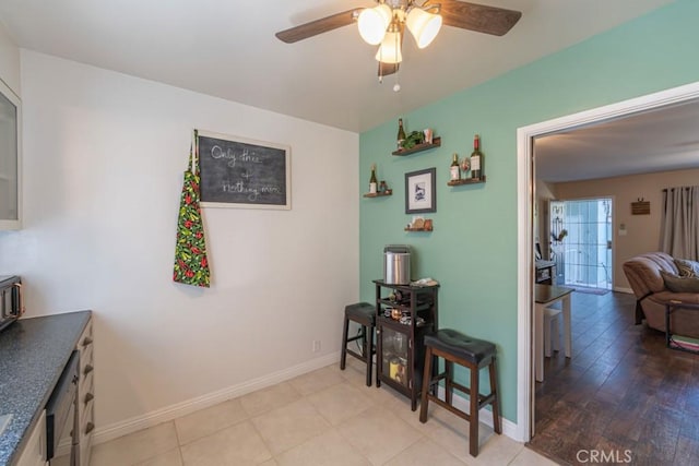 5270 E Anaheim Rd Unit 2, Long Beach, CA 90815 - dining area with a ceiling fan and baseboards