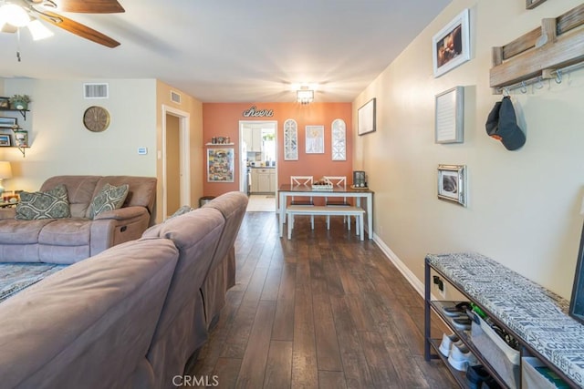 5270 E Anaheim Rd Unit 2, Long Beach, CA 90815 - living area featuring dark wood-style floors, a ceiling fan, and baseboards