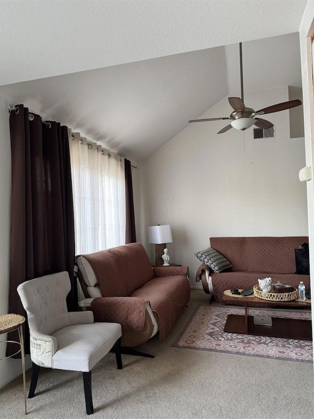 12090 Calle De Montana Unit 251, El Cajon, CA 92019 - living area with carpet floors, vaulted ceiling, visible vents, and ceiling fan