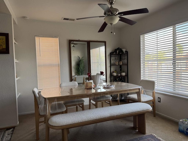 12090 Calle De Montana Unit 251, El Cajon, CA 92019 - carpeted dining space featuring baseboards, visible vents, ceiling fan, and a healthy amount of sunlight