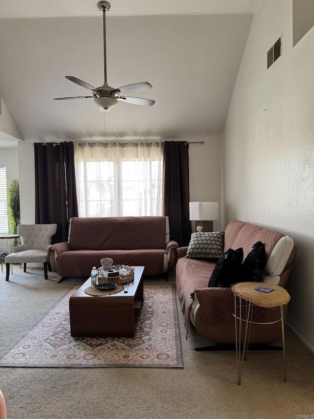 12090 Calle De Montana Unit 251, El Cajon, CA 92019 - living area with ceiling fan, visible vents, vaulted ceiling, and carpet
