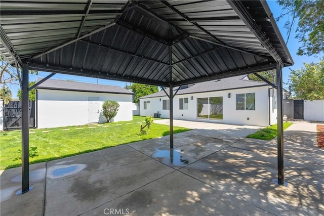 view of patio / terrace featuring a gazebo and fence