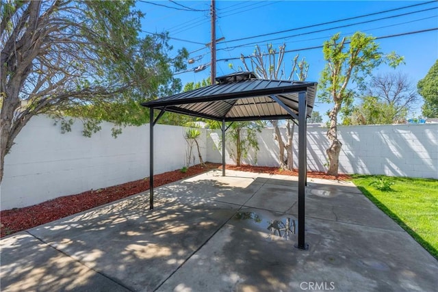 view of patio / terrace featuring a fenced backyard and a gazebo
