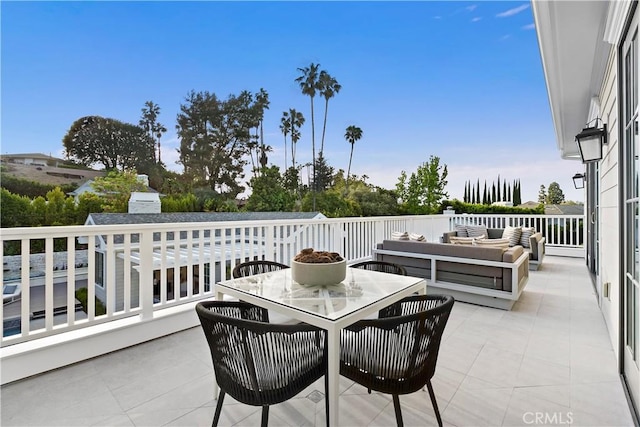 view of patio / terrace featuring outdoor dining space and an outdoor hangout area