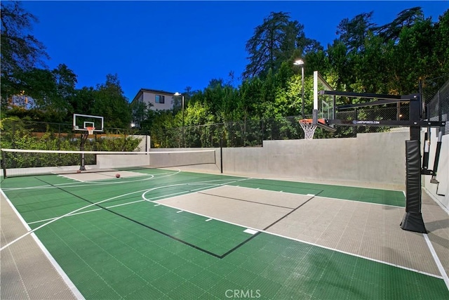 view of sport court featuring community basketball court and fence