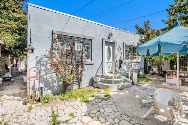 1361 W Vernon Ave, Los Angeles, CA 90037 - exterior space featuring stucco siding