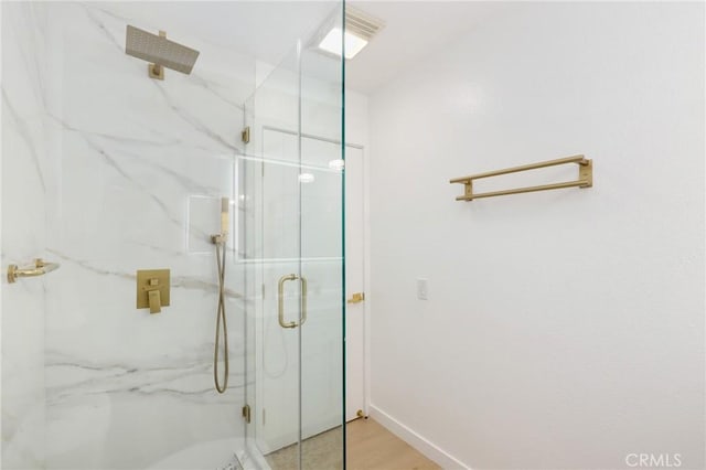 2405 Via Mariposa W Unit 1B, Laguna Woods, CA 92637 - full bath featuring a marble finish shower and baseboards
