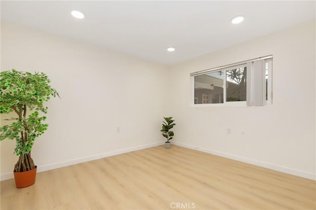 2405 Via Mariposa W Unit 1B, Laguna Woods, CA 92637 - empty room with light wood-type flooring, baseboards, and recessed lighting