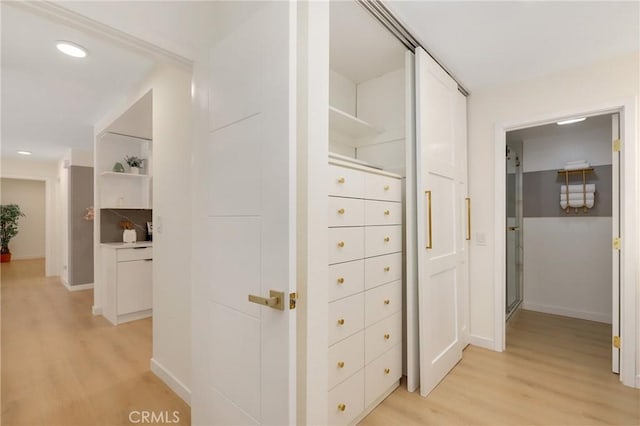 2405 Via Mariposa W Unit 1B, Laguna Woods, CA 92637 - corridor with light wood-style flooring, baseboards, and recessed lighting