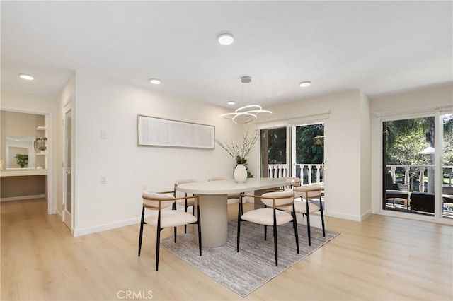 2405 Via Mariposa W Unit 1B, Laguna Woods, CA 92637 - dining room featuring light wood finished floors, baseboards, recessed lighting, and a chandelier