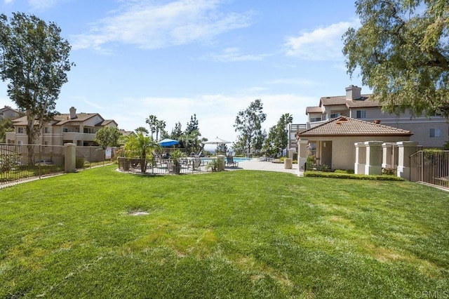 11365 Affinity Ct Unit 192, San Diego, CA 92131 - view of yard with a community pool and a patio area