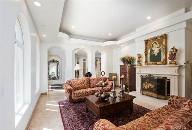 22751 Plummer St, Chatsworth, CA 91311 - living area featuring a premium fireplace, recessed lighting, and a raised ceiling