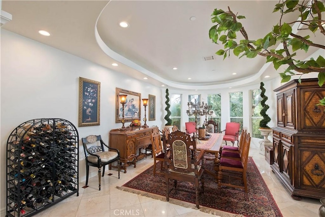 22751 Plummer St, Chatsworth, CA 91311 - dining space with light tile patterned floors, recessed lighting, a tray ceiling, and visible vents