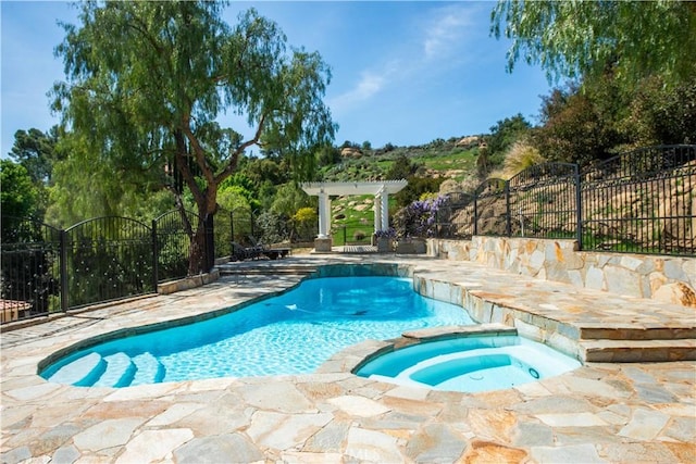 22751 Plummer St, Chatsworth, CA 91311 - view of pool featuring a pool with connected hot tub, a pergola, fence, and a patio