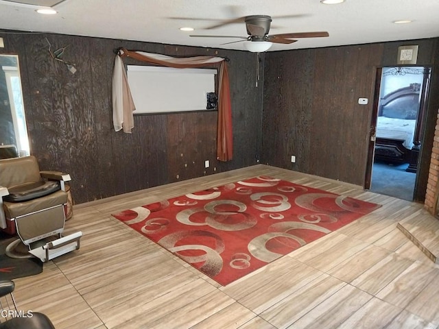 1420 S Butler Ave, Compton, CA 90221 - living area featuring ceiling fan, wood walls, and recessed lighting