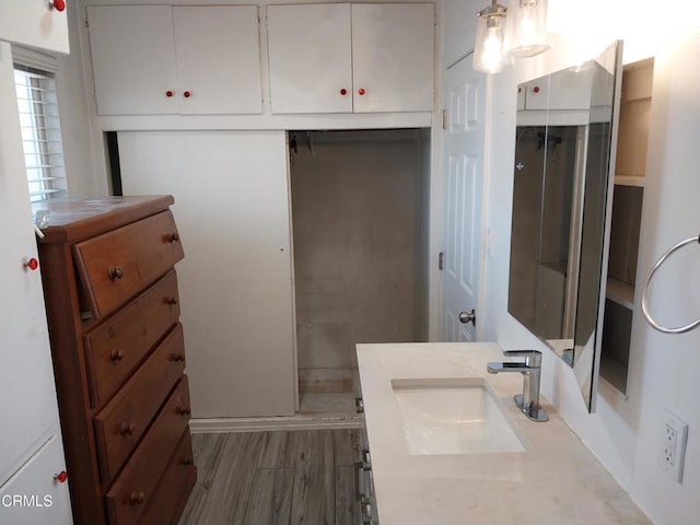 1420 S Butler Ave, Compton, CA 90221 - bathroom featuring vanity and wood finished floors