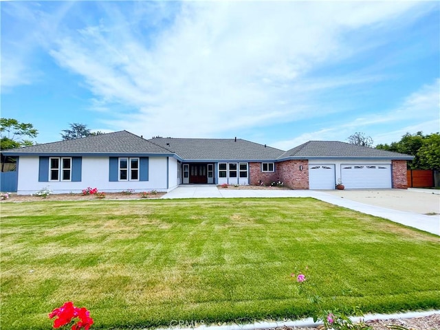 3518 N Mills Ave, Claremont, CA 91711 - single story home with an attached garage, concrete driveway, a front yard, and brick siding