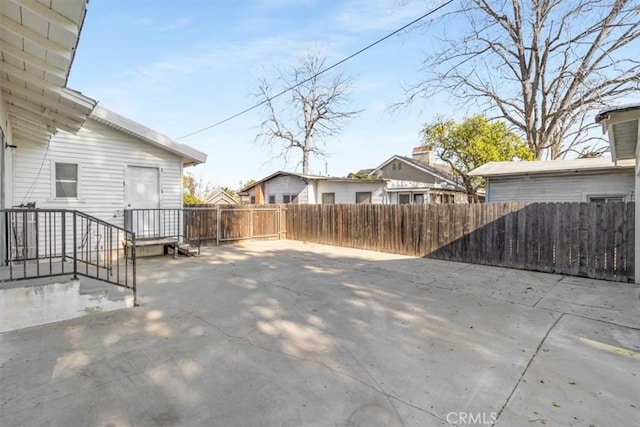 view of patio with a fenced backyard