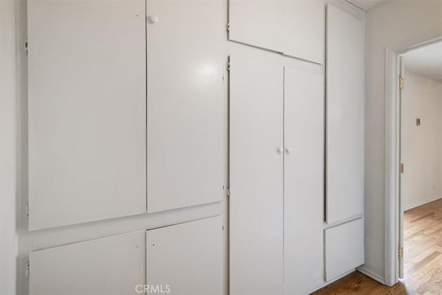 details featuring wood finished floors