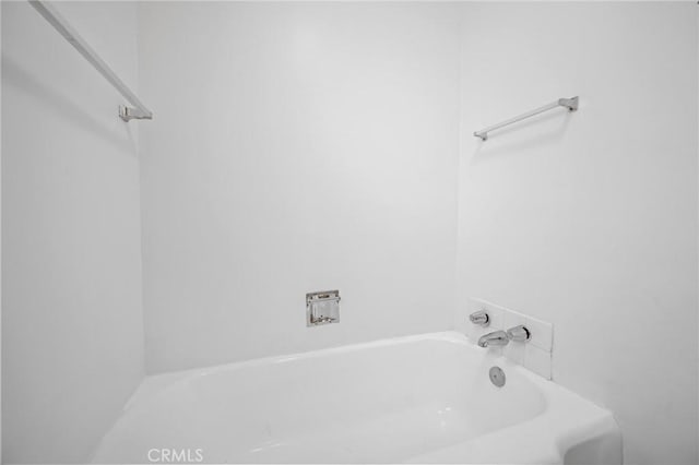 full bath featuring a bath