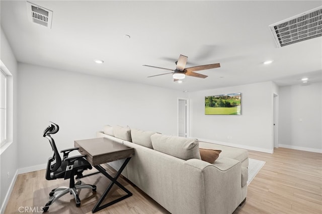 1772 Old Wagon Dr, Hemet, CA 92545 - living room with light wood-type flooring, a ceiling fan, baseboards, and visible vents