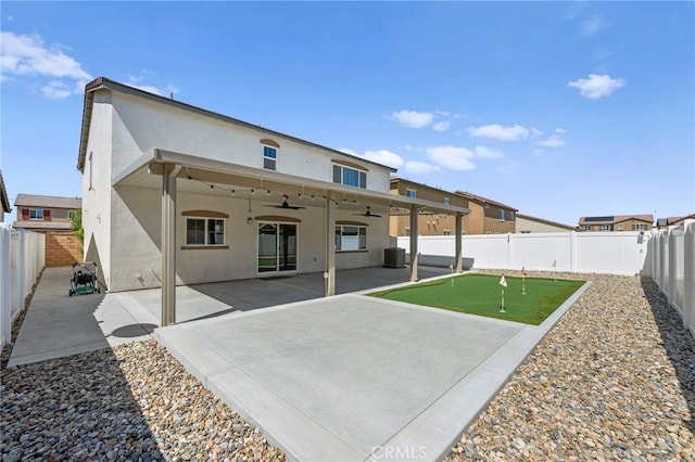 1772 Old Wagon Dr, Hemet, CA 92545 - rear view of property featuring a patio, a ceiling fan, a fenced backyard, and stucco siding