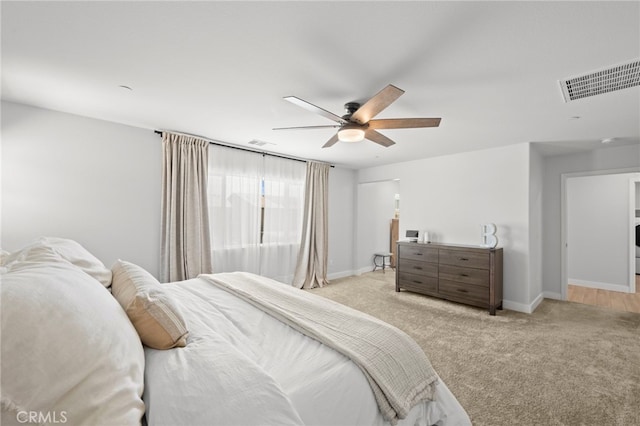 1772 Old Wagon Dr, Hemet, CA 92545 - bedroom featuring baseboards, visible vents, and light colored carpet