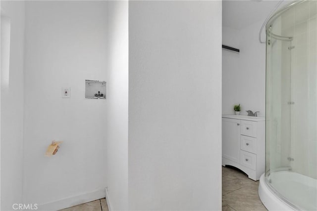 full bath featuring vanity and a stall shower