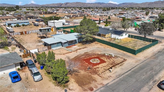 birds eye view of property featuring a residential view and a mountain view