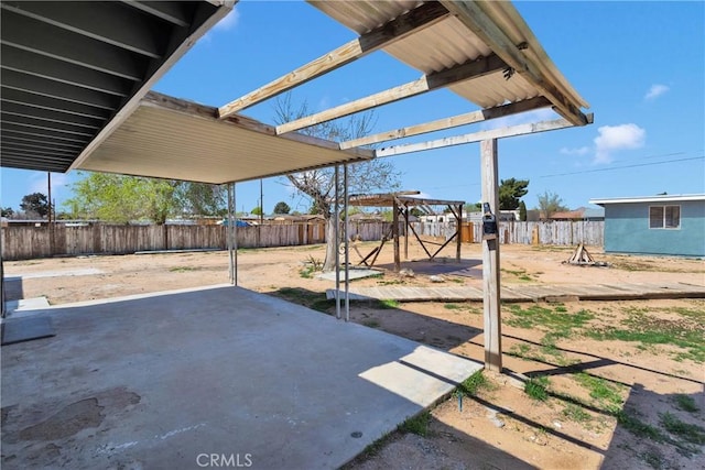 view of patio / terrace with a pergola and a fenced backyard