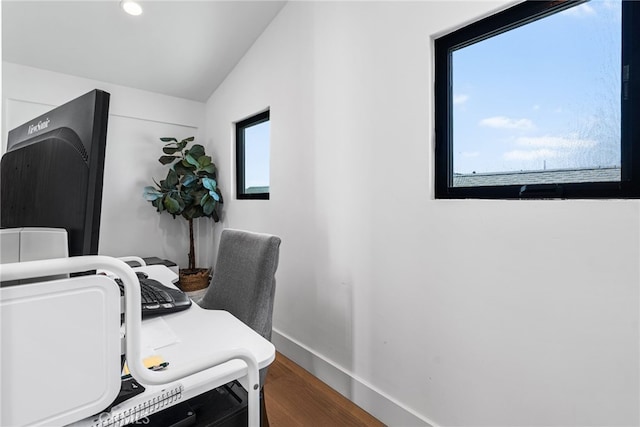 home office with baseboards, vaulted ceiling, wood finished floors, and recessed lighting