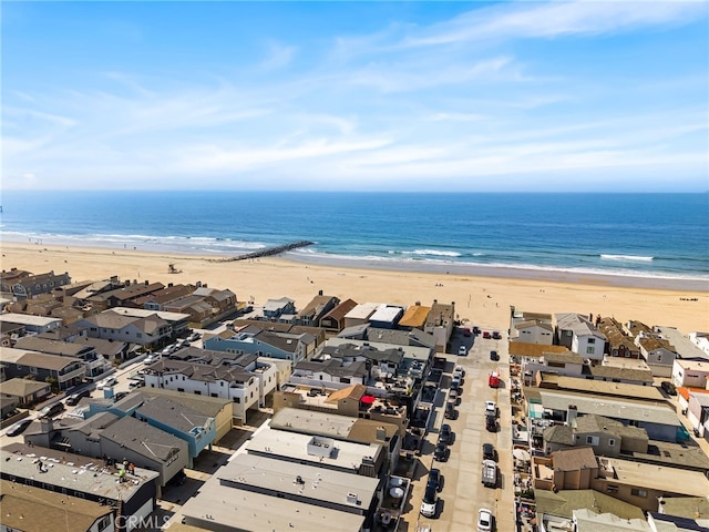 aerial view with a beach view, a residential view, and a water view