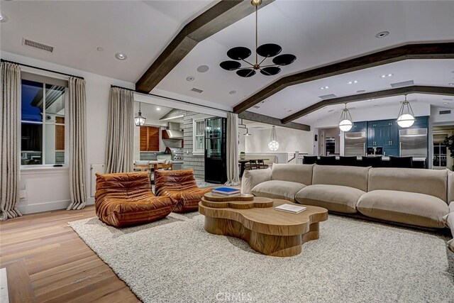 528 15th St, Manhattan Beach, CA 90266 - living area featuring vaulted ceiling with beams, visible vents, wood finished floors, and a chandelier