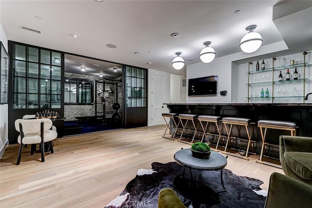 528 15th St, Manhattan Beach, CA 90266 - interior space with visible vents, bar, and wood finished floors