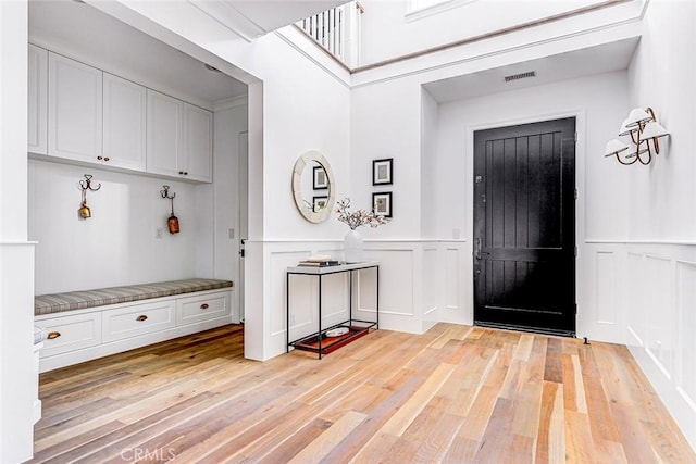 528 15th St, Manhattan Beach, CA 90266 - mudroom featuring a decorative wall, visible vents, light wood-type flooring, and wainscoting