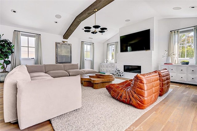 528 15th St, Manhattan Beach, CA 90266 - living area featuring a fireplace with flush hearth, recessed lighting, vaulted ceiling with beams, and wood finished floors