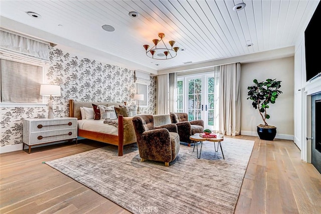 528 15th St, Manhattan Beach, CA 90266 - bedroom featuring light wood-style flooring, baseboards, wallpapered walls, french doors, and wood ceiling