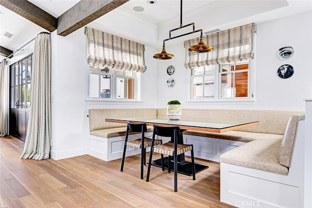 528 15th St, Manhattan Beach, CA 90266 - dining space with light wood finished floors, visible vents, breakfast area, baseboards, and beamed ceiling