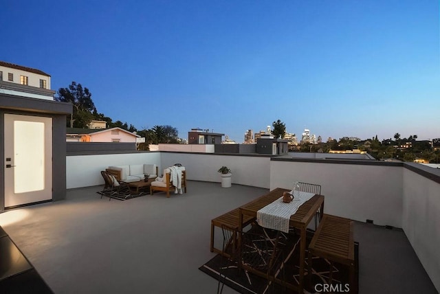 view of patio / terrace with a balcony