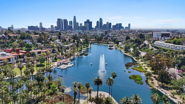 bird's eye view featuring a water view and a view of city