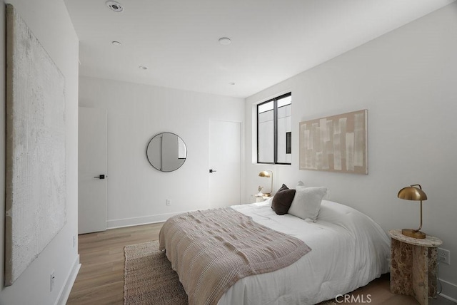 1315 W Cannon Dr, Los Angeles, CA 90026 - bedroom with wood finished floors and baseboards