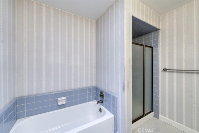 4837 N Hulbert Ave, Fresno, CA 93705 - full bathroom with wallpapered walls, a stall shower, a bath, and tile patterned flooring