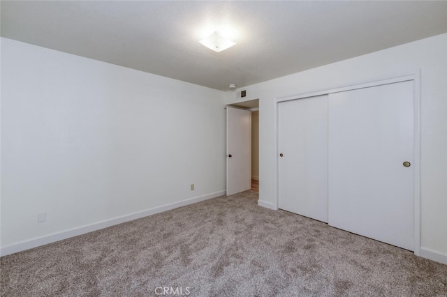 4837 N Hulbert Ave, Fresno, CA 93705 - unfurnished bedroom with carpet floors and a closet