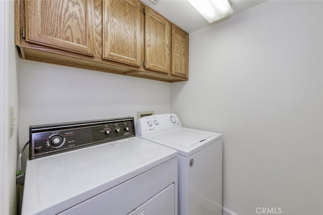 4837 N Hulbert Ave, Fresno, CA 93705 - washroom featuring cabinet space and washing machine and dryer