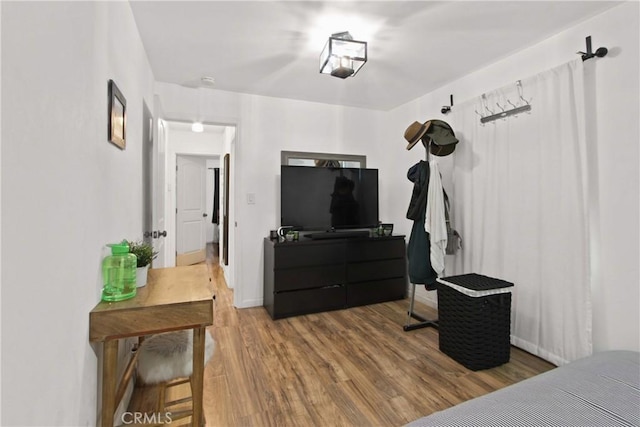 12152 Rosecrans Ave, Norwalk, CA 90650 - bedroom with wood finished floors