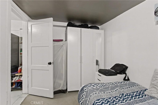 12152 Rosecrans Ave, Norwalk, CA 90650 - bedroom with concrete flooring