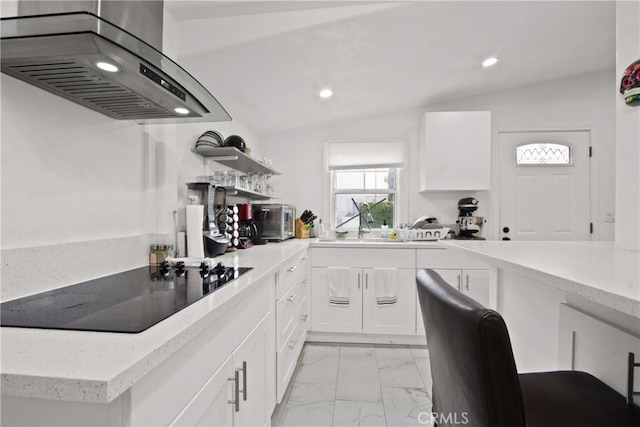 12152 Rosecrans Ave, Norwalk, CA 90650 - kitchen featuring wall chimney range hood, open shelves, white cabinets, lofted ceiling, and black electric stovetop