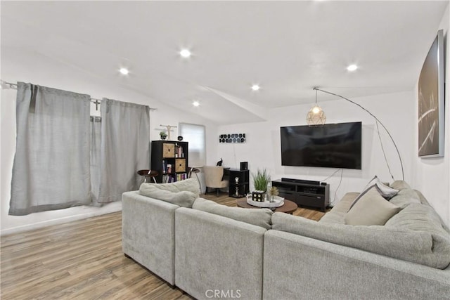 12152 Rosecrans Ave, Norwalk, CA 90650 - living area with wood finished floors, lofted ceiling, and recessed lighting