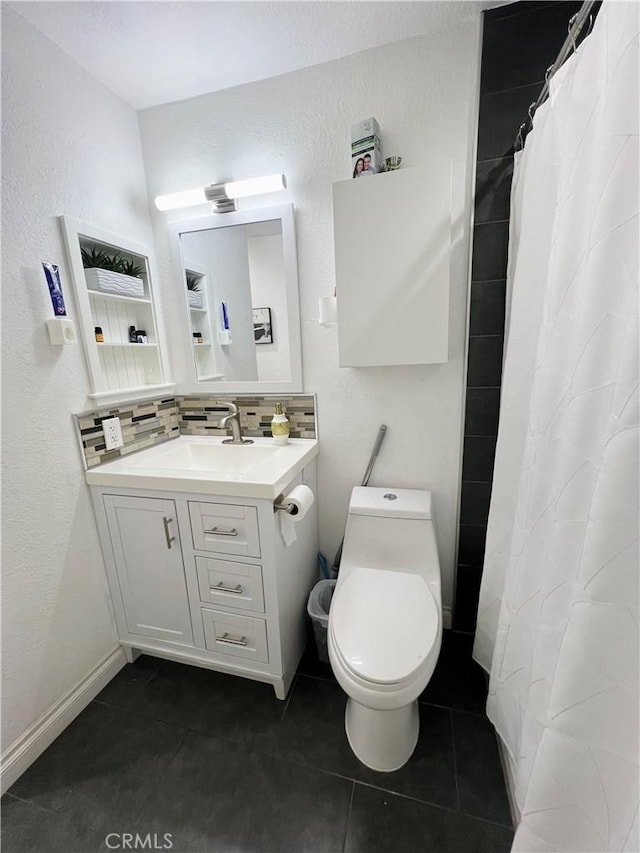17760 Palo Verde Ave Unit 27, Cerritos, CA 90703 - bathroom with tasteful backsplash, tile patterned floors, a shower with shower curtain, and vanity